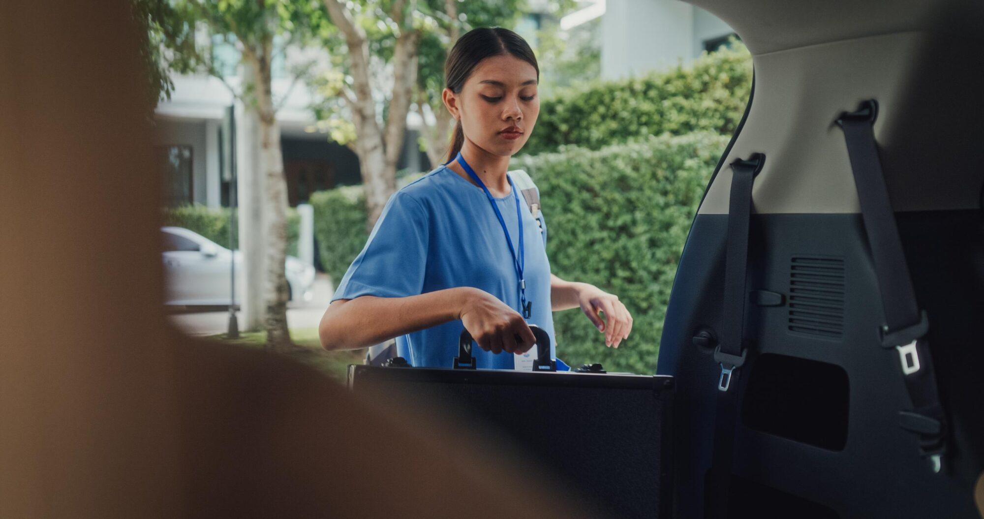 Mobile vet tech gathering her gear.